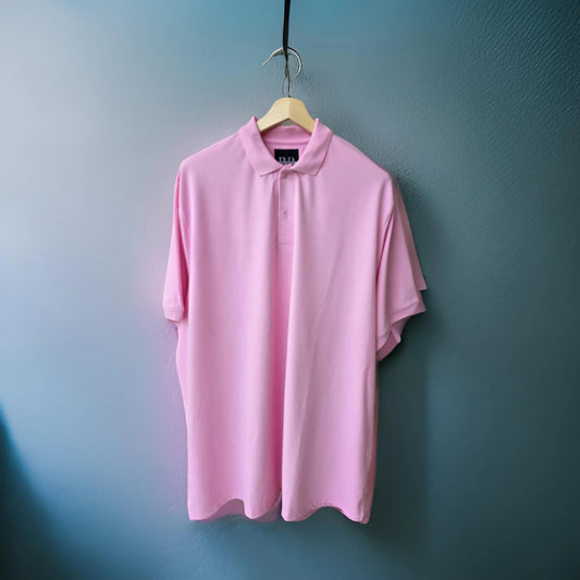Rose pink cotton-blend polo hanging front-facing, showing the body, collar and short sleeves