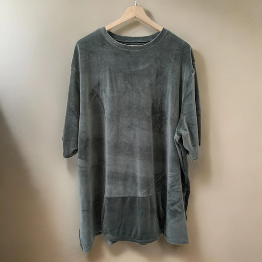 Dark green velvet sweatshirt hanging front-facing for a plus size men's sweatshirt fit guide