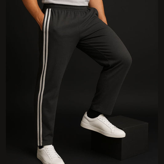 Dark grey full striped track pants for a men's styling guide